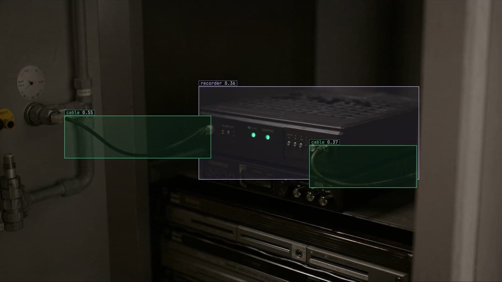 Compute box beside the recorder in a plant cabinet, recorder and cables boxed, generated scene with detections from our model