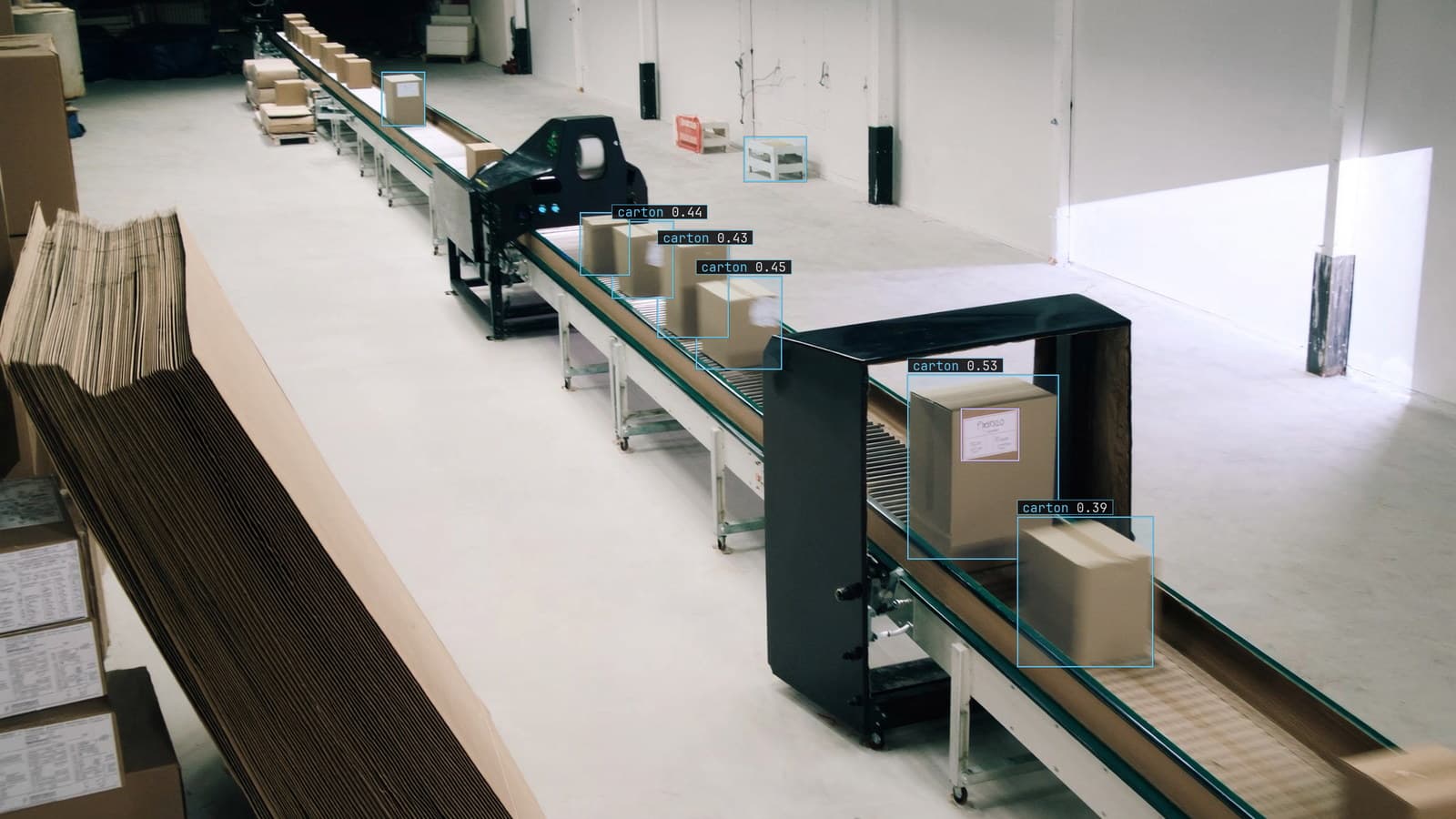 Packaging line with cartons and labels boxed as they pass the scanner, generated scene with detections from our model