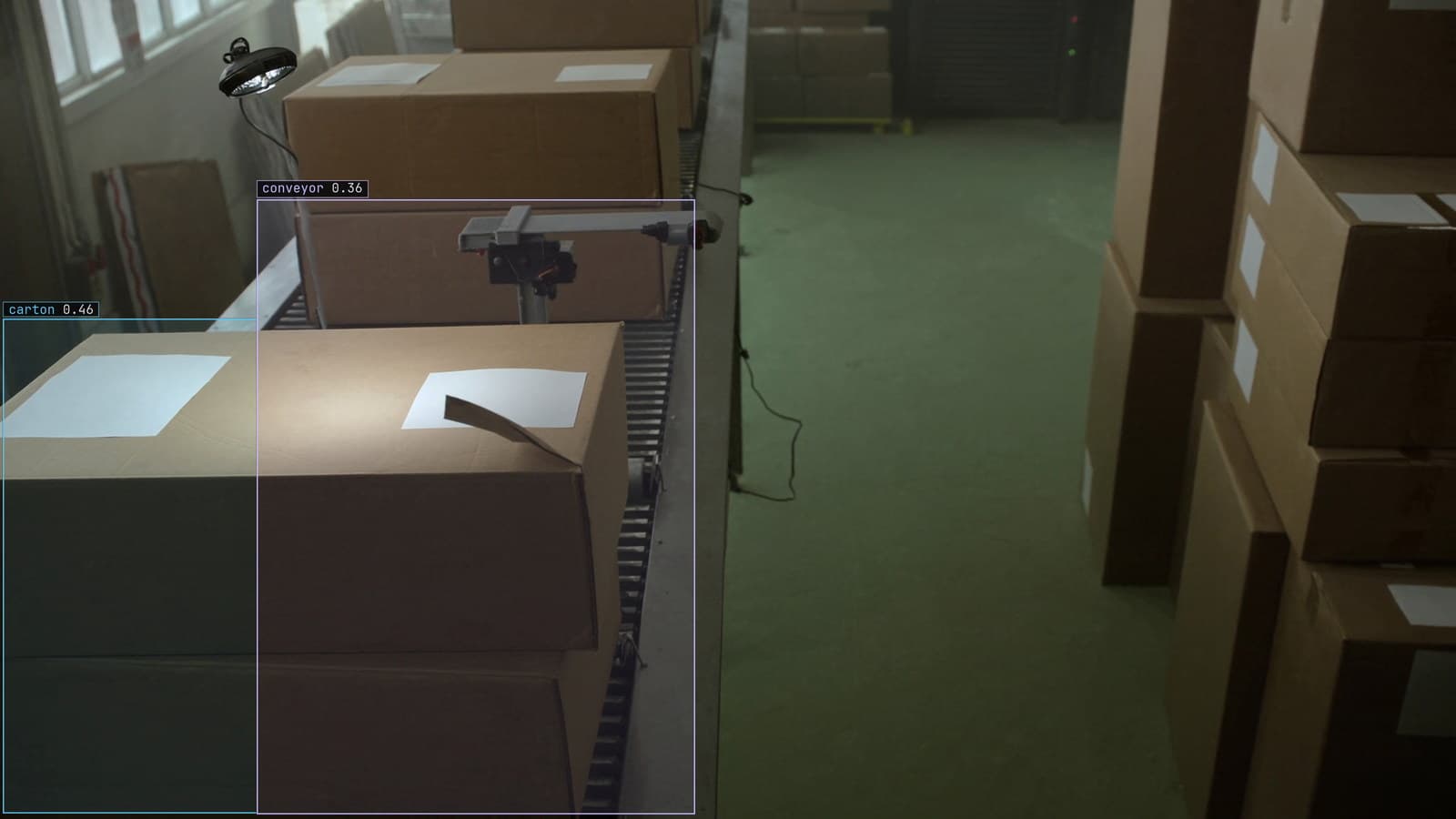 Packaging line, cartons past the scanner, generated scene with detections from our model